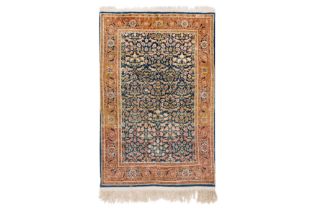 AN EXTREMELY FINE SIGNED SILK HEREKE RUG, TURKEY