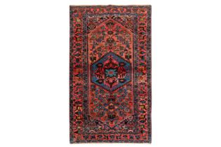 AN UNUSUAL NORTH-WEST PERSIAN RUG