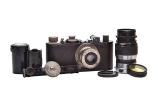 A Leica Standard Model E Camera Outfit