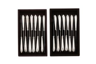 A set of twenty-four Elizabeth II sterling silver table knives, London 1974 by Tiffany and Co