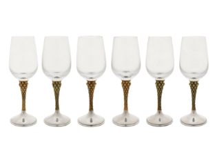 A cased set of six Elizabeth II modernist parcel gilt sterling silver wine glasses, London 1976 by A