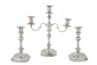 A suite of George V sterling silver candlestick and candelabra set, London 1911/12 by Thomas Bradbur
