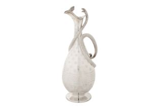 An interesting Victorian sterling silver claret jug, London 1869 by messrs Barnard