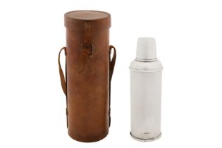 A George V sterling silver cased thermos flask, Chester 1910 by G & Co