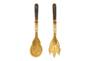 A pair of Victorian aesthetic sterling silver gilt and agate salad servers, Sheffield 1886 by Mappin