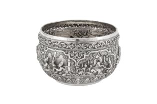 An early 20th century Burmese silver unmarked silver bowl, Rangoon dated 1935