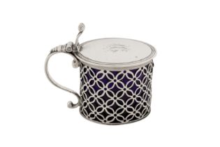 A George III sterling silver mustard pot, London 1767 by Augustin Le Sage