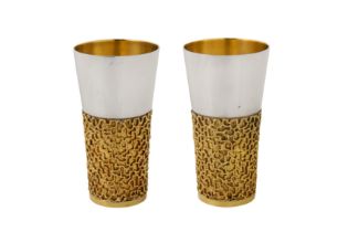 A pair of Elizabeth II modernist parcel gilt sterling silver beakers, London 1970 by Stuart Devlin (