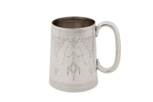 A Victorian sterling silver pint mug, London 1878 by Henry Holland