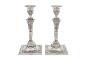 A pair of Victorian sterling silver candlesticks, London 1896 by Goldsmiths & Silversmiths Co