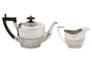 A Victorian sterling silver bachelor teapot, Birmingham 1900 by William Locke and Co