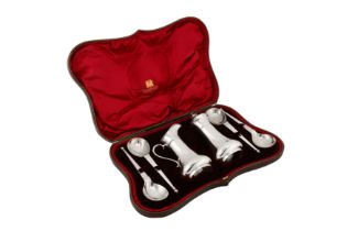 A cased Edwardian sterling silver sugar and cream dessert set, London 1903/04 by Jackson and Fullert