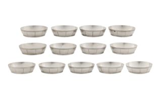 A set of thirteen mid-20th century American sterling silver small dishes or salts, New York circa 19