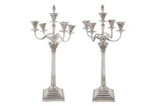 A pair of Victorian sterling silver five-light candelabra, London 1879 by Richard Hodd and Son