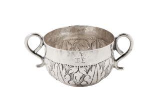 A Commonwealth sterling silver small porringer or caudle cup, London 1656 by John Cruttall (free 165