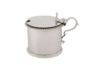 A Victorian sterling silver mustard pot, London 1852 by Richard Sibley II