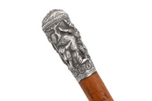 An early 20th century Burmese unmarked silver walking cane, probably Mandalay circa 1920