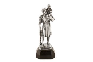 A George V sterling silver figure of Saint Christopher, London 1929 by Omar Ramsden (1873-1939)