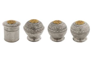 A set of four late 19th / early 20th century Malay unmarked gold mounted silver lime and salve boxes