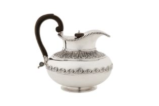 A George III sterling silver hot water pot or jug, London 1814 by Richard Sibley (this mark reg. 13t