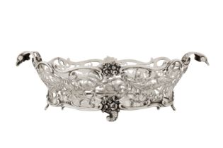 A George V sterling silver fruit basket, London 1910 by Daniel and John Welby