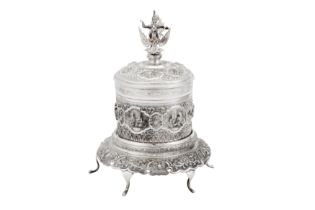 An early 20th century Burmese silver betel box on stand, Rangoon dated 1928