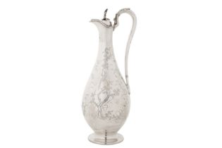 A Victorian sterling silver ‘aesthetic’ claret jug, London 1880 by Martin, Hall and Co