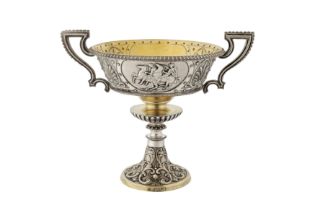 A Victorian parcel gilt sterling silver twin handled cup, London 1867 by John Le Gallais of Jersey