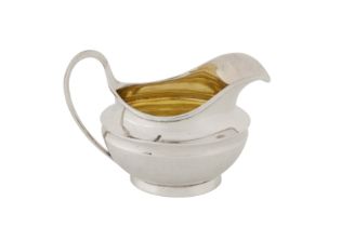 A George III sterling silver cream jug, London 1819 by Robert Garrard II (reg. 16th April 1818)