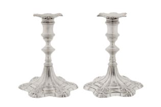 A pair of George III sterling silver dwarf or library candlesticks, London 1766 by Ebenezer Coker