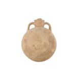 A 12TH-14TH CENTURY PERSIAN UNGLAZED MOULDED POTTERY PILGRIM FLASK