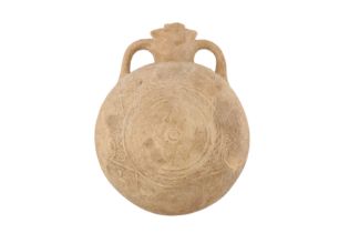 A 12TH-14TH CENTURY PERSIAN UNGLAZED MOULDED POTTERY PILGRIM FLASK