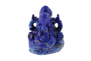 A 20TH CENTURY INDIAN LAPIS LAZULI FIGURINE OF GANESH