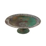 A 12TH CENTURY PERSIAN SELJUK SILVER INLAID BRONZE FOOTED PLATE OR 'TAZA'