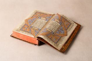 AN EXCEPTIONAL EARLY 19TH CENTURY INDIAN ILLUMINATED QUR'AN, DATED 1222AH (1807 AD)