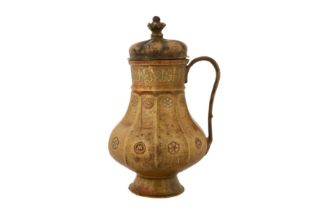 A 12TH CENTURY PERSIAN SELJUK JUG WITH SILVER AND COPPER INLAY