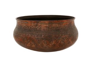 A 17TH CENTURY SAFAVID ENGRAVED TINNED COPPER TAS BOWL WITH THE NAMES OF THE 12 SHI'A IMAMS