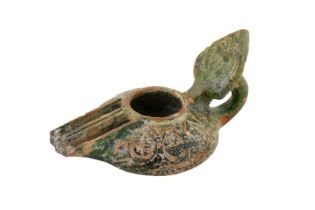 A RARE 8TH-9TH CENTURY SYRIAN UMAYYAD GREEN GLAZED OIL LAMP