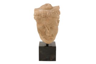 A FINE 2ND-3RD CENTURY GANDHARA STUCCO MAN’S FACE