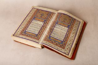 AN IMPRESSIVE MID-19TH CENTURY PERSIAN ILLUMINATED QAJAR QUR’AN, DATED 1286AH (1869AD)