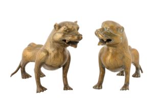 A PAIR OF 18TH CENTURY DECCAN BRONZE MODELS OF TIGERS