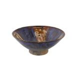 A FINE 13TH CENTURY PERSIAN KASHAN COPPER LUSTRE AND COBALT BLUE GLAZED POTTERY BOWL