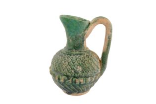 A RARE 8TH-9TH CENTURY SYRIAN UMAYYAD GREEN GLAZED JUG