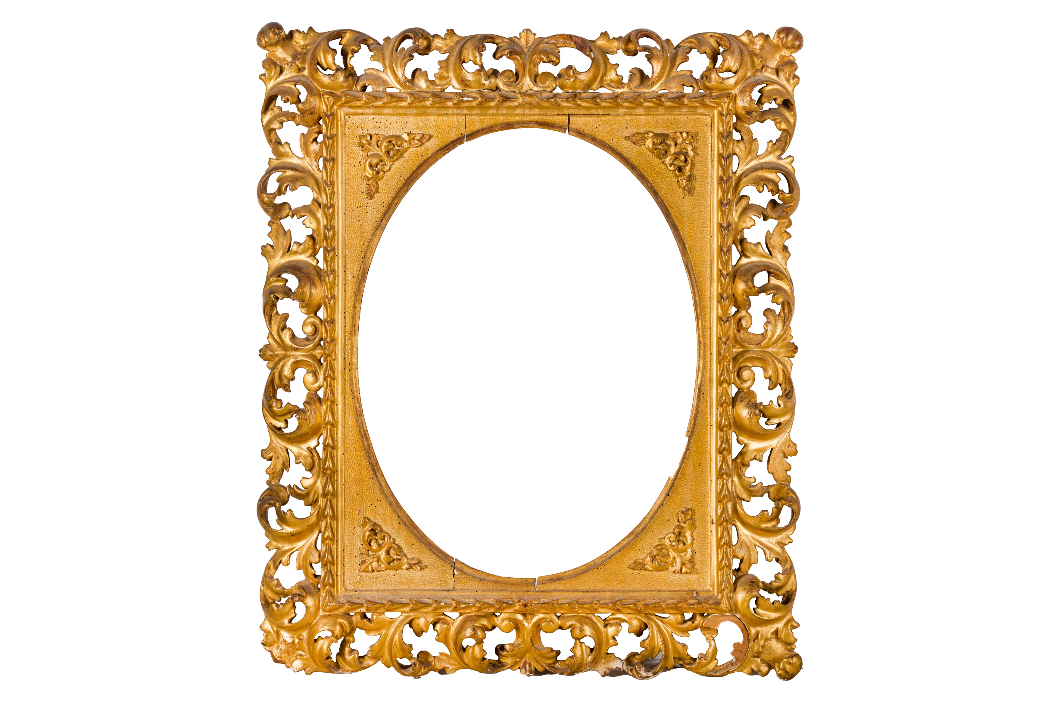 A FLORENTINE 19TH CENTURY CARVED, PIERCED, SWEPT AND GILDED FRAME