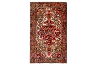 A FINE ANTIQUE SAROUK RUG, WEST PERSIA