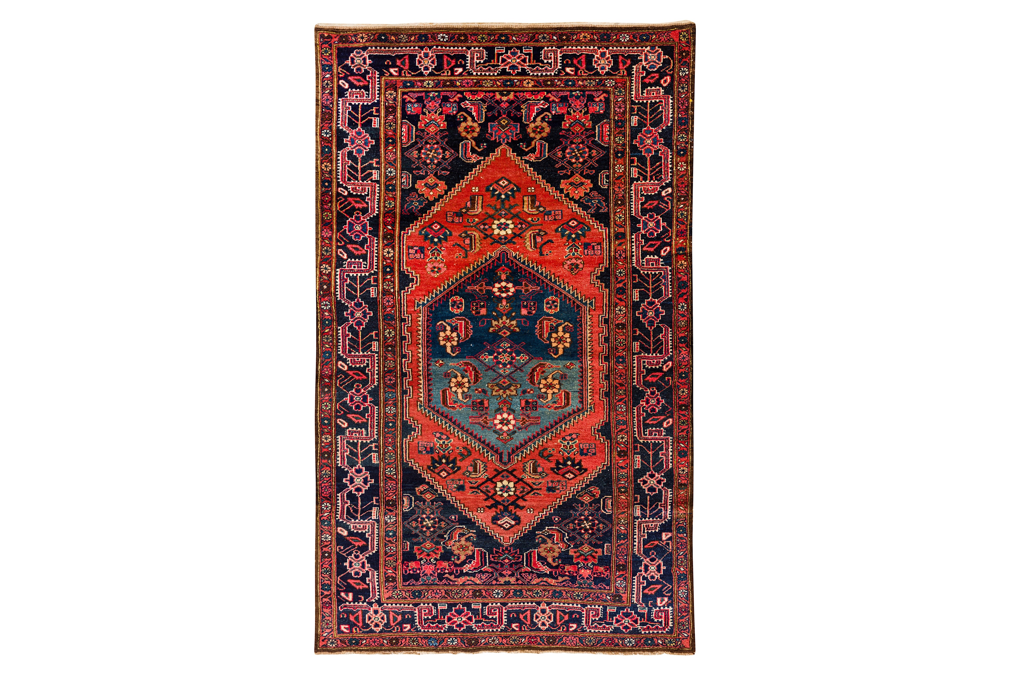 A FINE WEST PERSIAN RUG