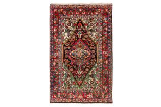 A FINE WEST PERSIAN RUG