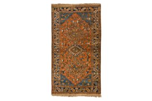 AN ANTIQUE HERIZ RUG, NORTH-WEST PERSIA