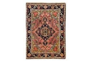 AN ANTIQUE SAROUK RUG, WEST PERSIA