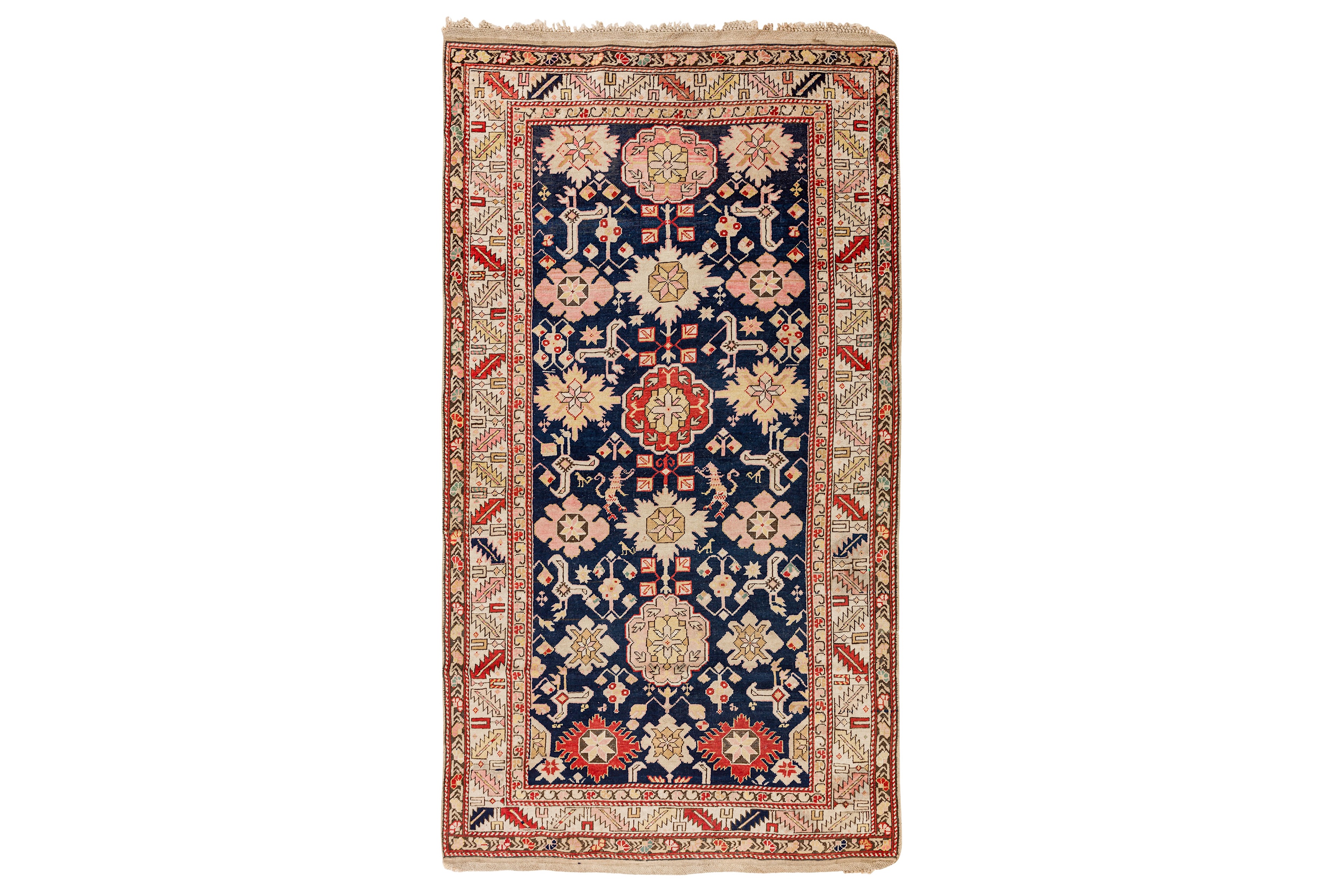 AN ANTIQUE KUBA RUG, EAST CAUCASUS